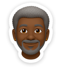 a Gentle smile on an older black man with a manicured gray afro and goatee with light gray hair and two small gold earrings